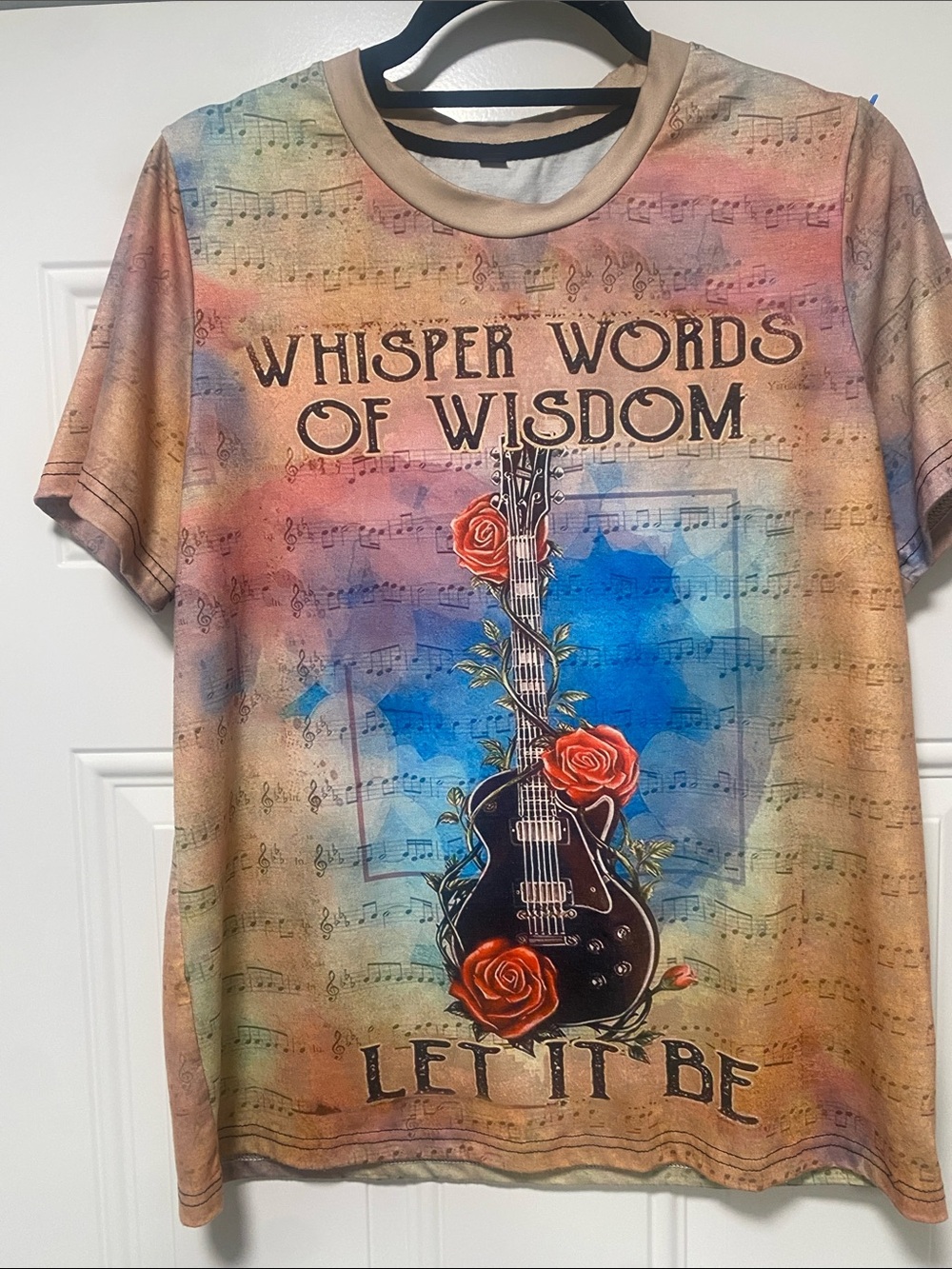 🎸 ROCK 'N' ROLL ROMANCE 🌹 Up your style with this iconic 'Let It Be' tee! Sz M